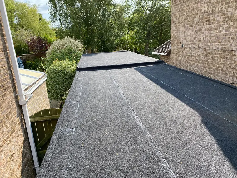 Torch-on felt flat roof on a single-storey extension, from above